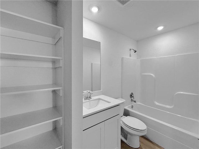 200 Greer St, Pea Ridge, AR 72751 - full bathroom featuring bathtub / shower combination, toilet, vanity, wood finished floors, and recessed lighting