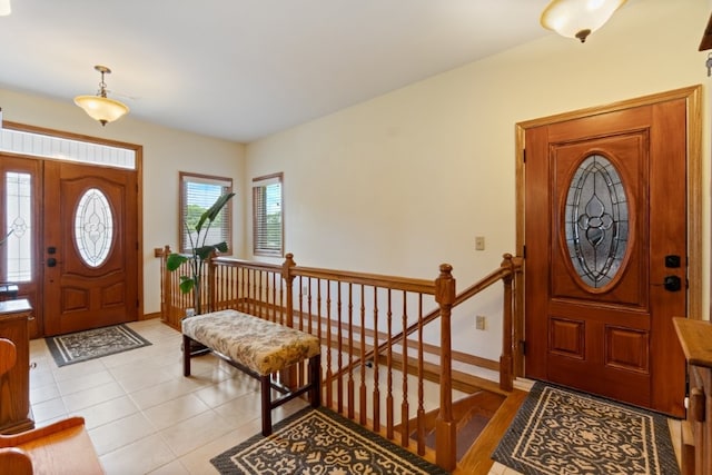 4 Torrido Ln, Bella Vista, AR 72715 - foyer entrance with light tile patterned flooring and baseboards