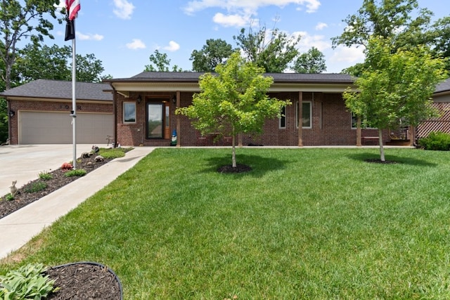 4 Torrido Ln, Bella Vista, AR 72715 - view of front of property with driveway, a front yard, a garage, and brick siding