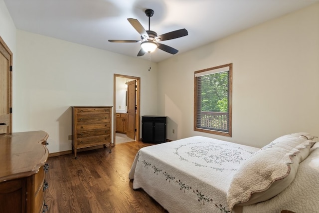 4 Torrido Ln, Bella Vista, AR 72715 - bedroom featuring dark wood-style flooring, ceiling fan, ensuite bathroom, and baseboards
