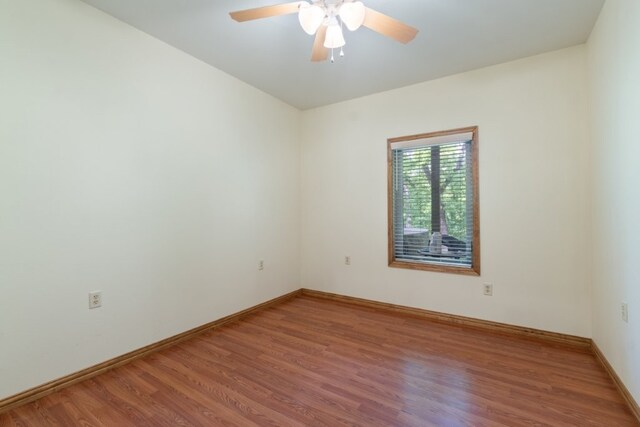 4 Torrido Ln, Bella Vista, AR 72715 - unfurnished room with light wood-style flooring, ceiling fan, and baseboards