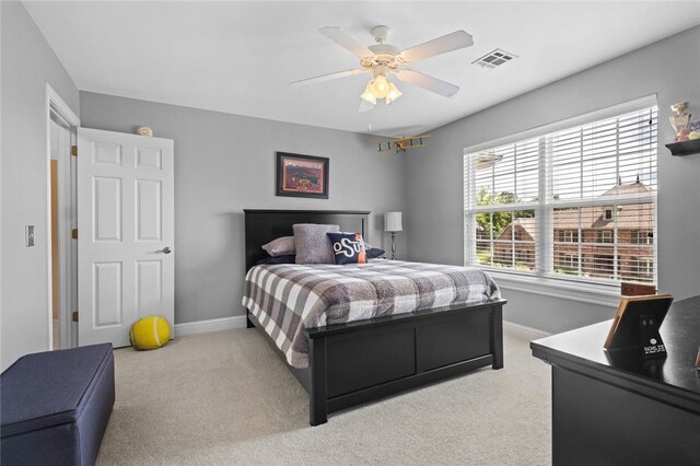 7 W Leiston Dr, Rogers, AR 72758 - bedroom with carpet, baseboards, and a ceiling fan