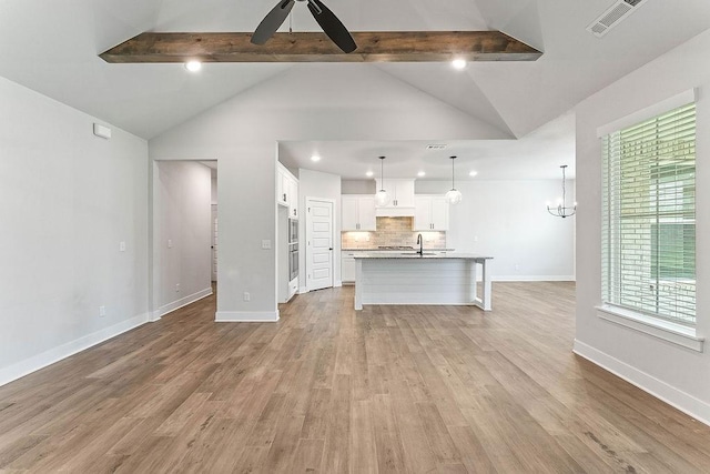 901 Carlock Dr, Pea Ridge, AR 72751 - unfurnished living room with a sink, baseboards, recessed lighting, light wood-style flooring, and a ceiling fan