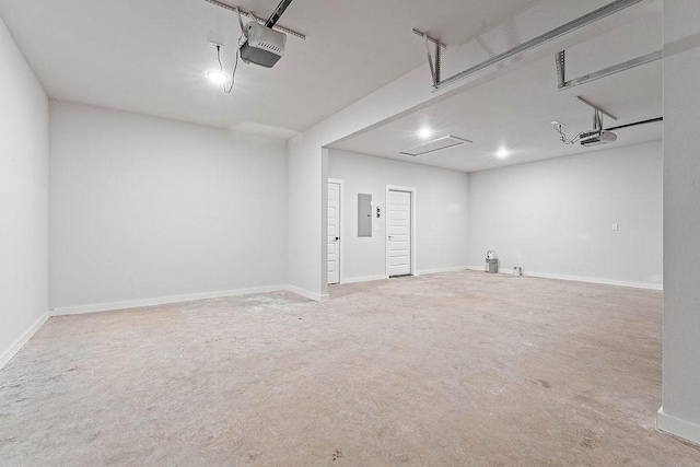 901 Carlock Dr, Pea Ridge, AR 72751 - garage featuring electric panel and a garage door opener