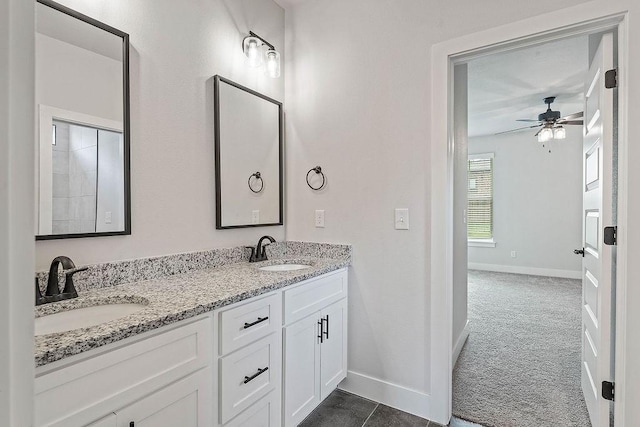 901 Carlock Dr, Pea Ridge, AR 72751 - full bath featuring baseboards, double vanity, and a ceiling fan