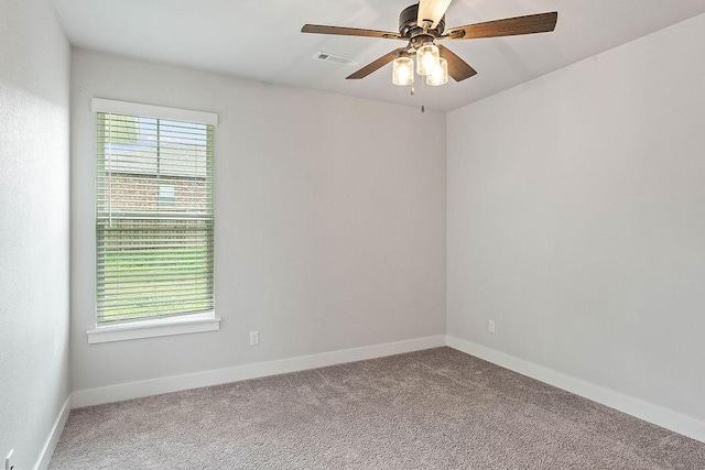 901 Carlock Dr, Pea Ridge, AR 72751 - spare room with carpet, baseboards, and ceiling fan