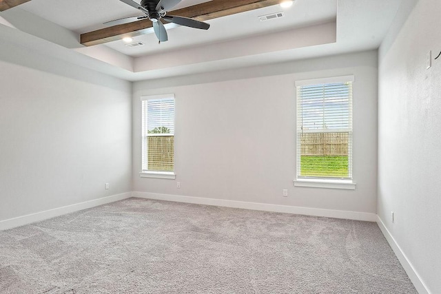 901 Carlock Dr, Pea Ridge, AR 72751 - empty room featuring healthy amount of natural light, ceiling fan, carpet, and beamed ceiling