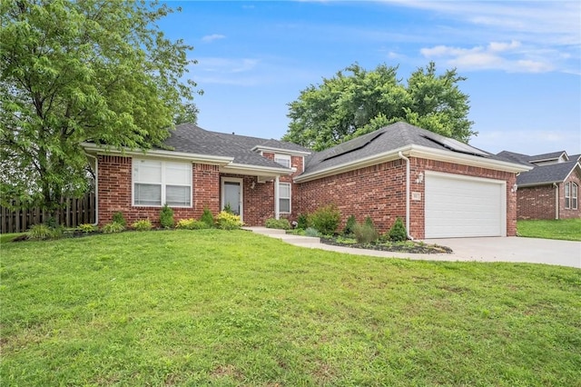 301 Halleck Coach Rd, Centerton, AR 72719 - view of front facade featuring solar panels, brick siding, concrete driveway, a garage, and roof with shingles