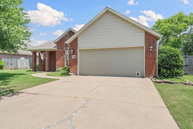 1750 Lancaster Dr, Springdale, AR 72762 - ranch-style house featuring brick siding, an attached garage, and driveway