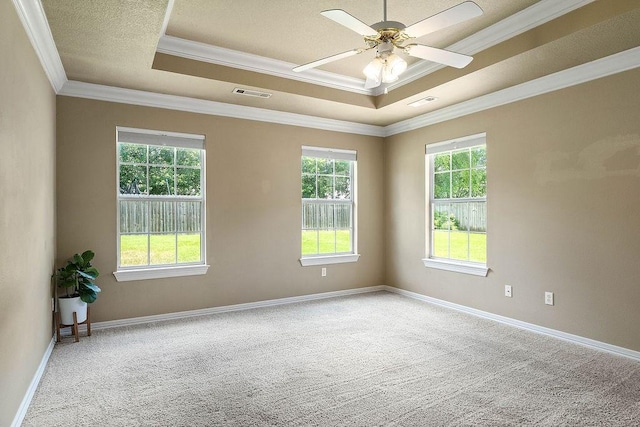 1750 Lancaster Dr, Springdale, AR 72762 - carpeted spare room with a tray ceiling, crown molding, ceiling fan, and baseboards