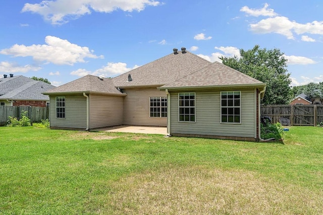 1750 Lancaster Dr, Springdale, AR 72762 - back of property featuring a patio and roof with shingles