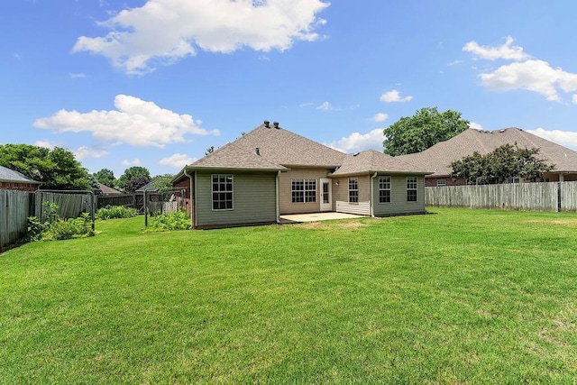 1750 Lancaster Dr, Springdale, AR 72762 - back of property featuring a patio and roof with shingles