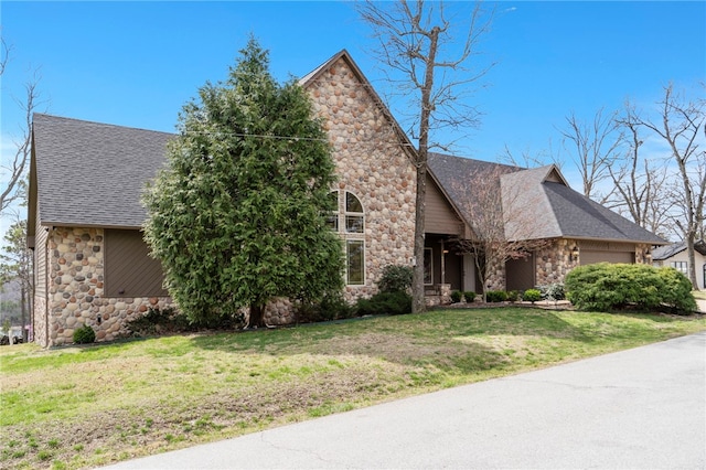 8093 Rockwood Ln, Rogers, AR 72756 - view of front of property featuring stone siding, an attached garage, a front yard, and a shingled roof