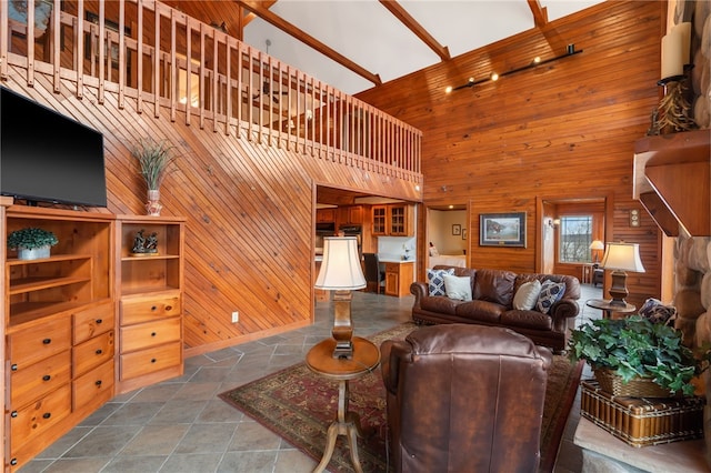 8093 Rockwood Ln, Rogers, AR 72756 - living area with wooden walls and a high ceiling