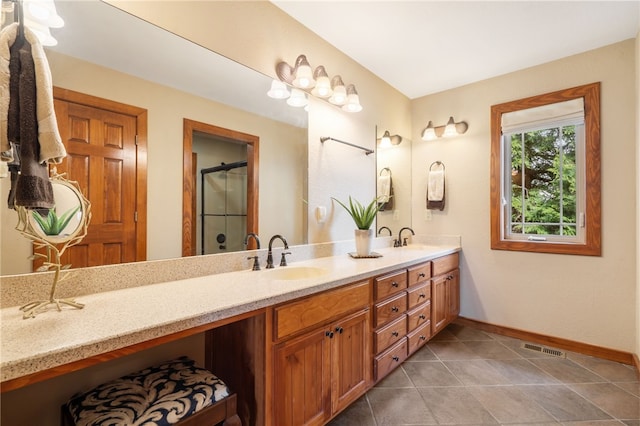 8093 Rockwood Ln, Rogers, AR 72756 - full bath with double vanity, baseboards, a shower with door, and tile patterned flooring