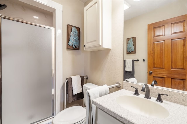 8093 Rockwood Ln, Rogers, AR 72756 - bathroom featuring toilet, a shower stall, and vanity