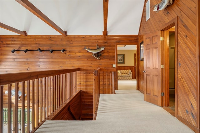 8093 Rockwood Ln, Rogers, AR 72756 - hallway with wood walls and carpet flooring