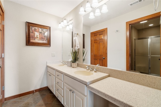 8093 Rockwood Ln, Rogers, AR 72756 - full bathroom featuring double vanity, baseboards, a shower with door, and tile patterned floors