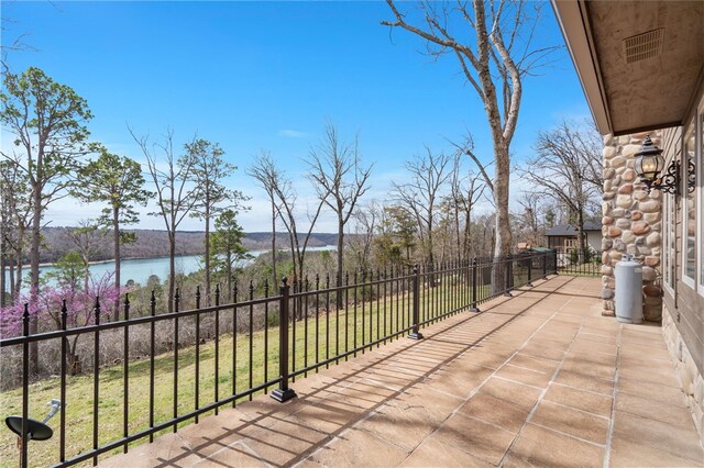 8093 Rockwood Ln, Rogers, AR 72756 - view of patio / terrace with a balcony and a water view