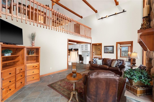8093 Rockwood Ln, Rogers, AR 72756 - living area featuring a towering ceiling, baseboards, and tile patterned floors