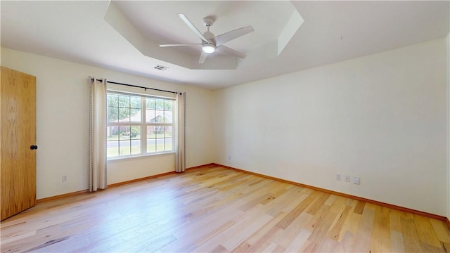 325 Northcrest Ave, Lowell, AR 72745 - unfurnished room with light wood-style floors, a ceiling fan, and baseboards