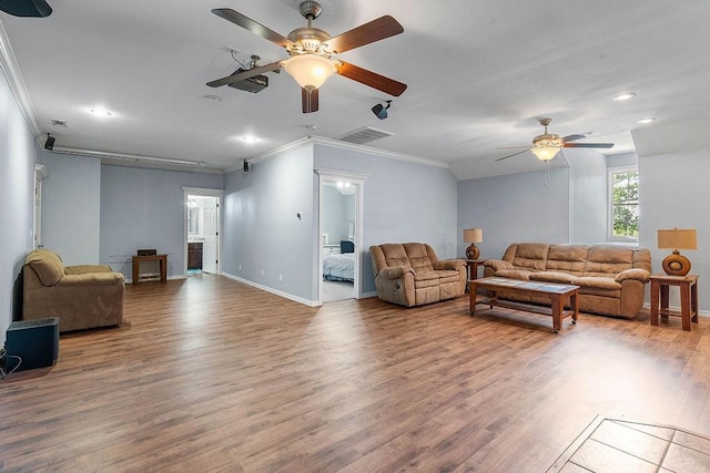 4206 NE Kenton Ave, Bentonville, AR 72712 - living area with ceiling fan, ornamental molding, wood finished floors, recessed lighting, and baseboards