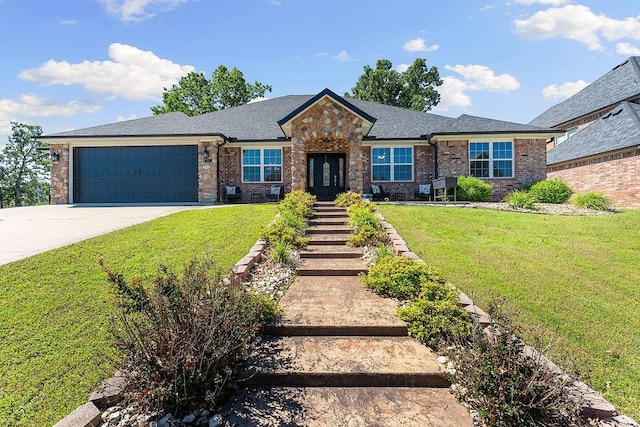 4206 NE Kenton Ave, Bentonville, AR 72712 - view of front of property featuring an attached garage, concrete driveway, a front lawn, and brick siding