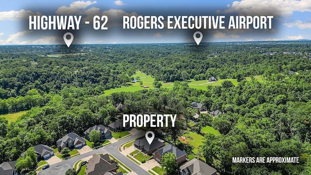 4206 NE Kenton Ave, Bentonville, AR 72712 - aerial perspective of suburban area with a forest