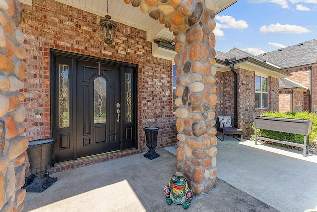 4206 NE Kenton Ave, Bentonville, AR 72712 - doorway to property with brick siding