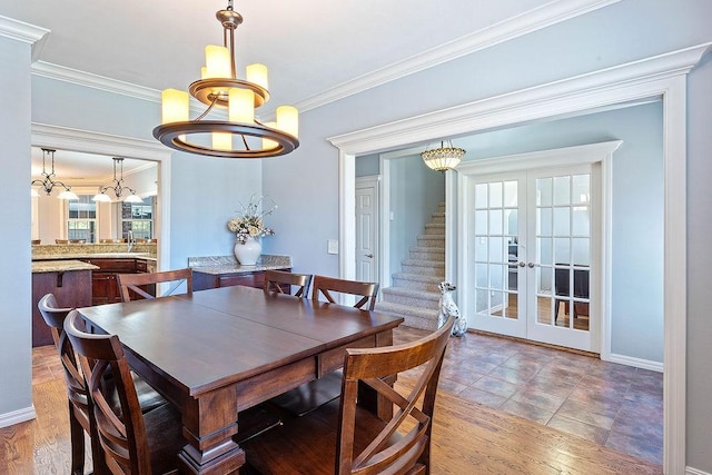4206 NE Kenton Ave, Bentonville, AR 72712 - dining room with a chandelier, french doors, stairway, ornamental molding, and baseboards