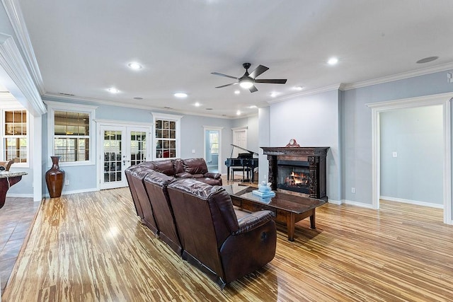 4206 NE Kenton Ave, Bentonville, AR 72712 - living area with french doors, healthy amount of natural light, baseboards, ceiling fan, and crown molding