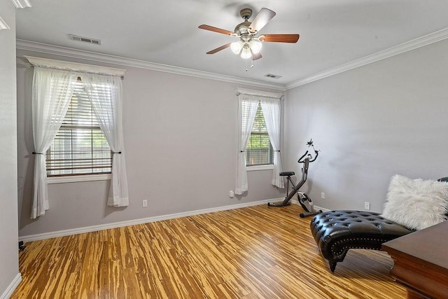 4206 NE Kenton Ave, Bentonville, AR 72712 - exercise room with wood finished floors, baseboards, a ceiling fan, and ornamental molding