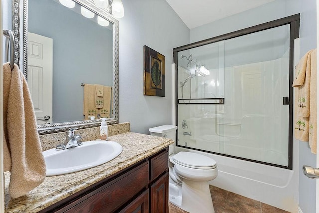 4206 NE Kenton Ave, Bentonville, AR 72712 - bathroom featuring vanity, toilet, and enclosed tub / shower combo