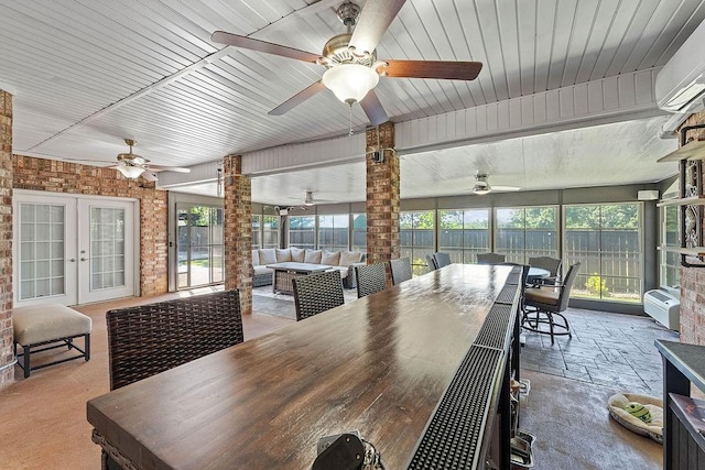 4206 NE Kenton Ave, Bentonville, AR 72712 - sunroom / solarium with ceiling fan, french doors, and an outdoor hangout area
