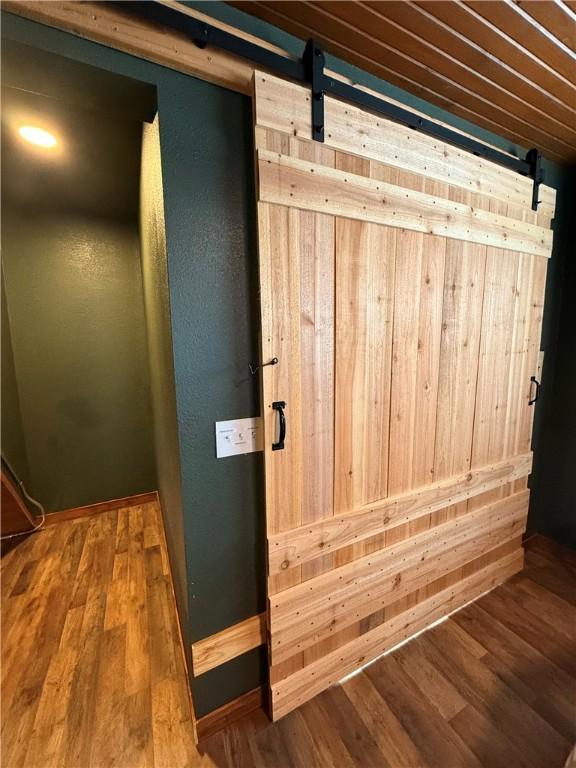 2711 Skyline Dr, Russellville, AR 72802 - detailed view of a barn door and wood finished floors