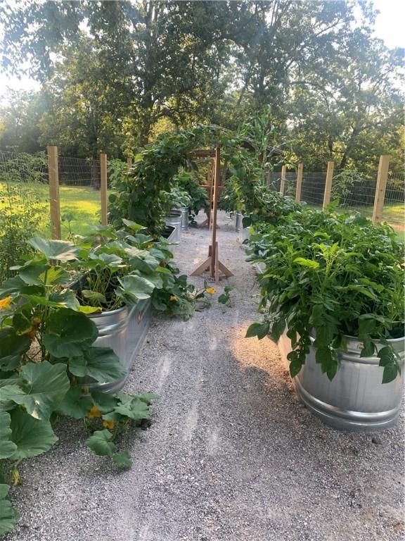 14620 Ravenwood Ln, Garfield, AR 72732 - view of yard with a garden