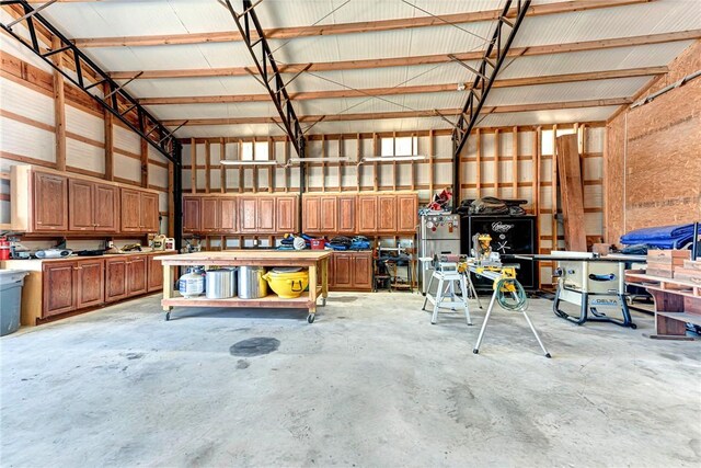 14620 Ravenwood Ln, Garfield, AR 72732 - garage with a workshop area
