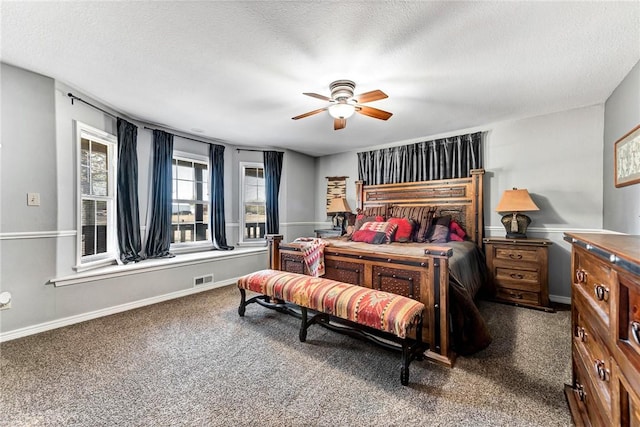 14620 Ravenwood Ln, Garfield, AR 72732 - carpeted bedroom with a textured ceiling, baseboards, and a ceiling fan
