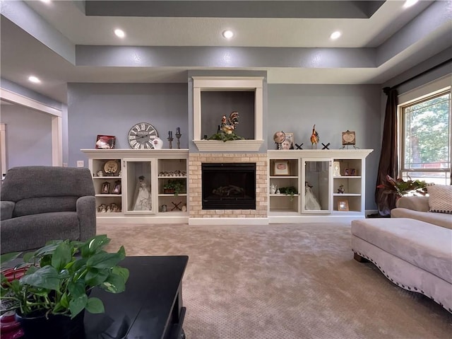 10059 Birdie St, Dardanelle, AR 72834 - carpeted living room with recessed lighting and a brick fireplace