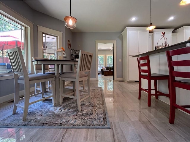 10059 Birdie St, Dardanelle, AR 72834 - dining space with baseboards, recessed lighting, and light wood-style floors
