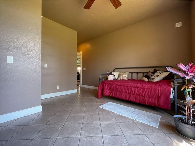 10059 Birdie St, Dardanelle, AR 72834 - tiled bedroom featuring lofted ceiling, baseboards, and a ceiling fan
