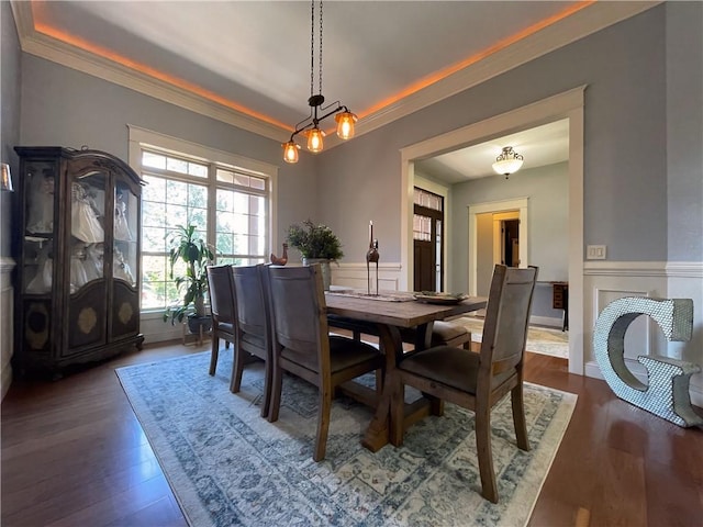 10059 Birdie St, Dardanelle, AR 72834 - dining area with wainscoting, dark wood-type flooring, ornamental molding, and a decorative wall