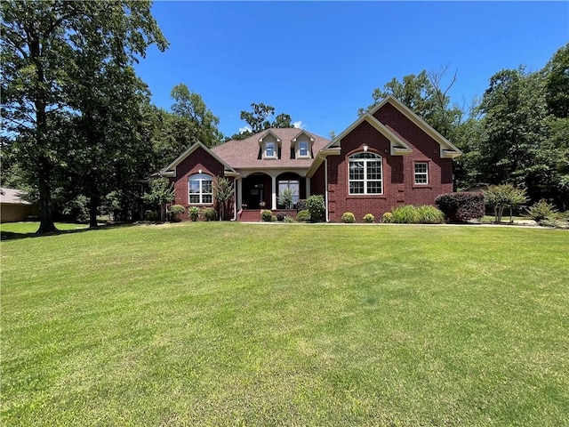 10059 Birdie St, Dardanelle, AR 72834 - view of front of property featuring a front lawn and brick siding