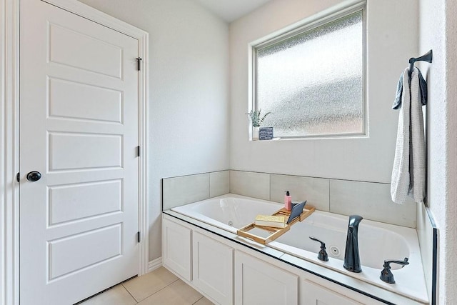 1904 Bergman Rd, Pea Ridge, AR 72751 - bathroom with a tub with jets and tile patterned floors