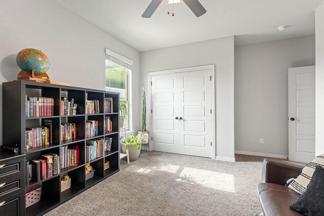 1904 Bergman Rd, Pea Ridge, AR 72751 - living area featuring ceiling fan, carpet flooring, and baseboards