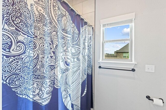 1904 Bergman Rd, Pea Ridge, AR 72751 - bathroom featuring a shower with shower curtain