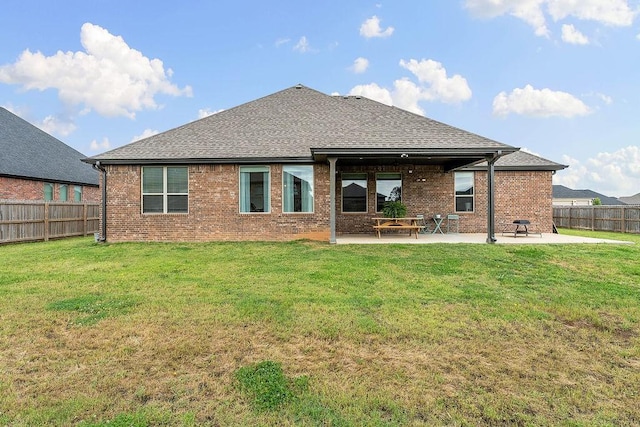 1904 Bergman Rd, Pea Ridge, AR 72751 - rear view of house featuring a patio, brick siding, and roof with shingles