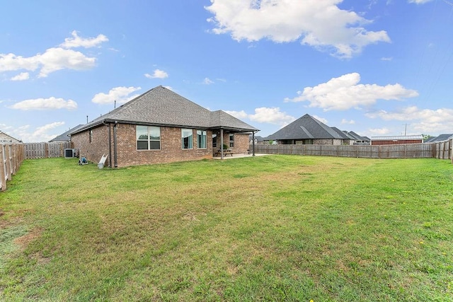 1904 Bergman Rd, Pea Ridge, AR 72751 - rear view of house with brick siding, central AC unit, a patio, and roof with shingles