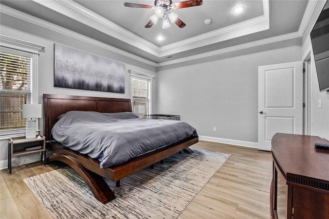 236 Ranalli Ave, Springdale, AR 72762 - bedroom with a tray ceiling, light wood-style floors, crown molding, a ceiling fan, and recessed lighting