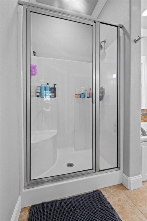 236 Ranalli Ave, Springdale, AR 72762 - bathroom with a shower stall and tile patterned flooring